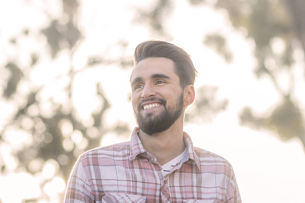 istock Bright day, adult young man smiling. 625955600