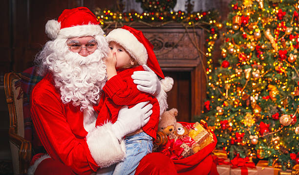 4,500+ Santa Hugging Child Stock Photos, Pictures & Royalty-Free Images ...