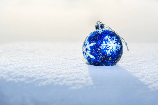 istock Blue Christmas Ball on snow 625955810