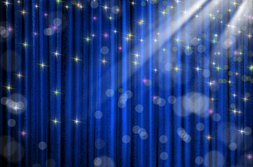 background image of blue curtain and abstract lights