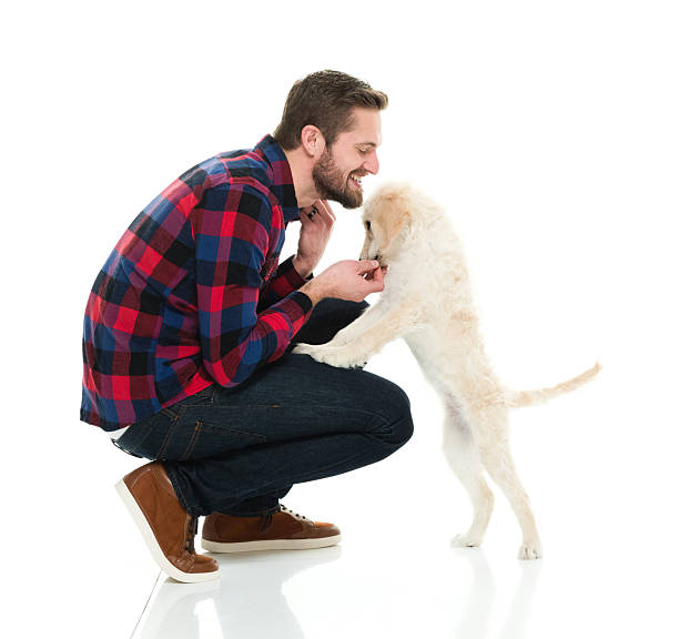 istock Smiling man bonding with his dog 625959972