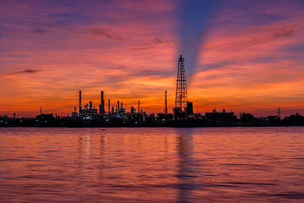 istock Oil refinery and surrounding communities at twilight 625962912