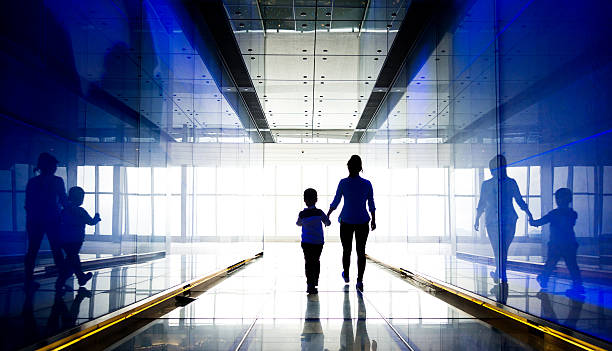 istock Mother and son walking into the light 625964096