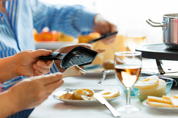 Traditional Swiss winter meal. Raclette. stock photo