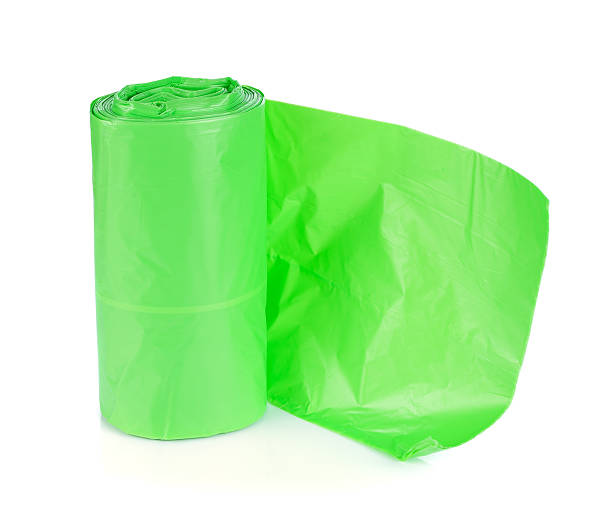istock green garbage bags isolated on white 625969368