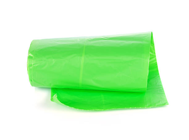 istock green garbage bags isolated on white 625969390