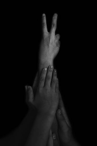 istock children helping raise broken arm up 625969680