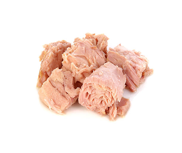 istock Tuna. Canned fish isolated on white 625969774
