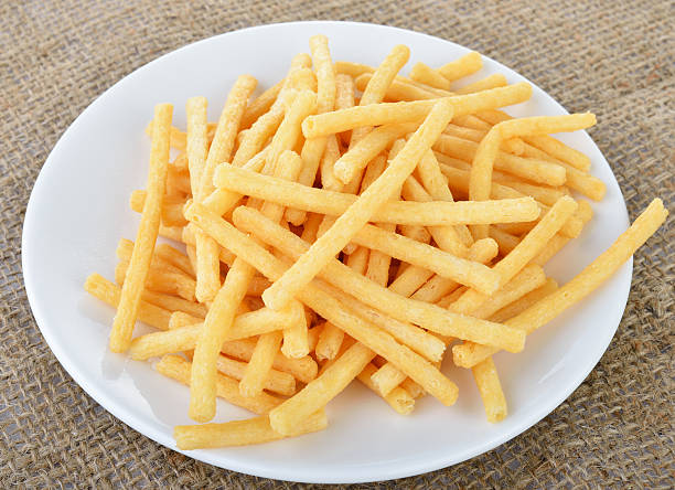 istock Sweet potato chips on white plate 625971948