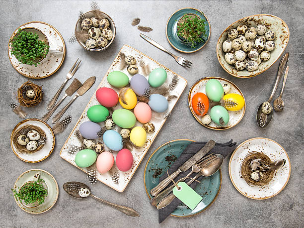 easter dinner decorations colored eggs flat lay - retro revival food easter napkin imagens e fotografias de stock