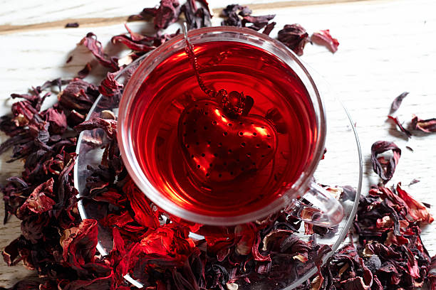 istock Red Hibiscus tea in glass mug 625974588