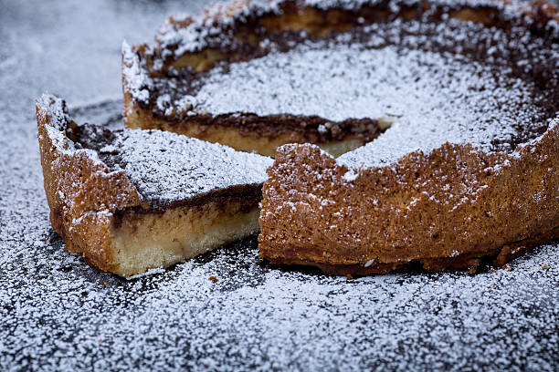istock Homemade chocolate tart on black background 625977096