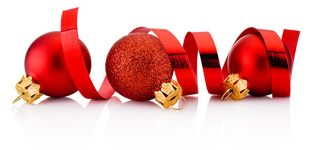 three red christmas baubles and curling paper isolated on white - ribbon curled up hanging christmas imagens e fotografias de stock