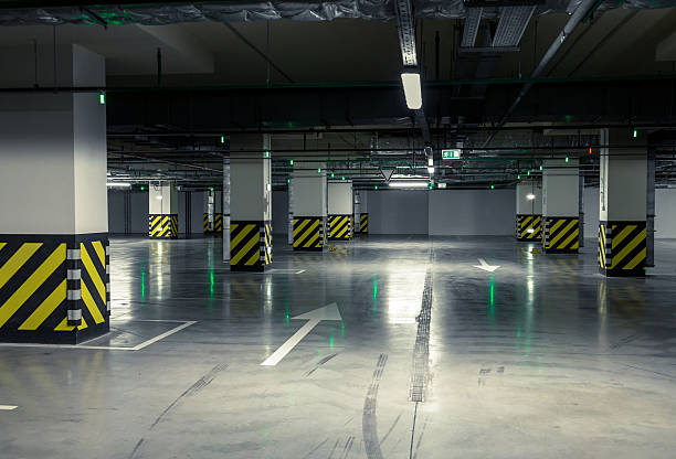 istock Parking garage, underground interior with a few parked cars 625986558