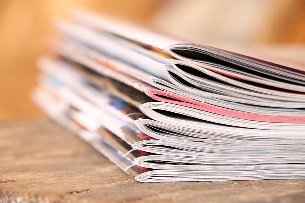 istock Magazines on the wooden table 625987546