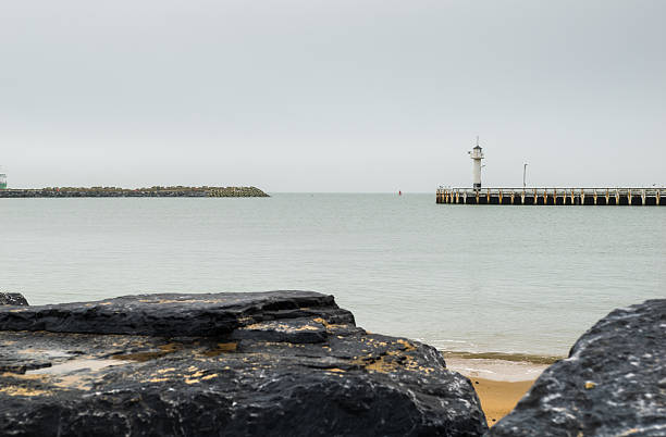 istock Beach in Ostend and lighthouse, Belgium 625987878