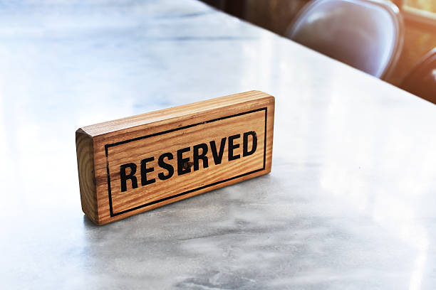 istock Reserved Sign on the Mable table at the Restaurant 625988296