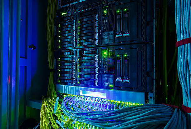 Network switch and UTP ethernet cables close-up in  server room