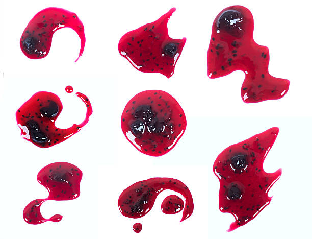 istock Red berries jam splash, drops isolated on white background. 625990544
