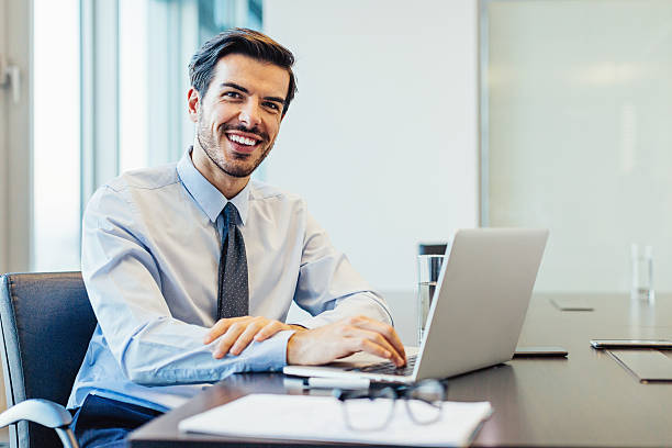 Smiling businessman in the office