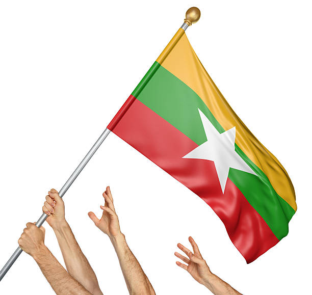 equipe de povos mãos levantando a bandeira nacional de mianmar - burmese flag - fotografias e filmes do acervo