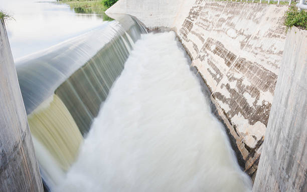 istock motion blur of waterfall from overflow of dam 626002988