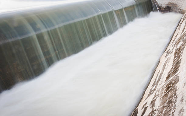 istock motion blur of waterfall from overflow of dam 626003090