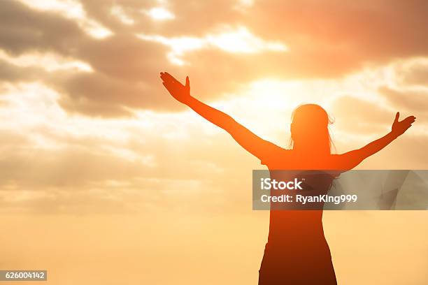 Silhouette Of Woman Pray Stock Photo - Download Image Now - Motivation, Inspiration, Hope - Concept