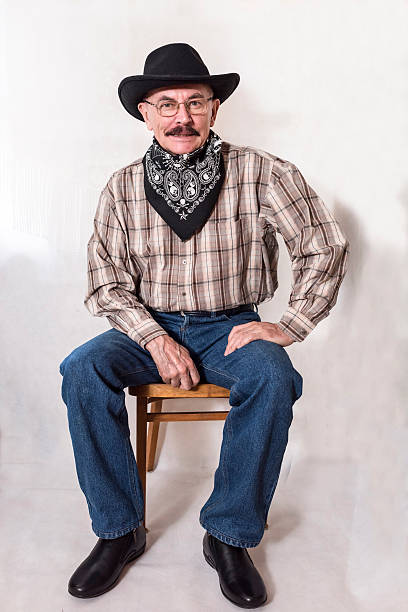 istock The cowboy with mustache, in a black hat 626004824