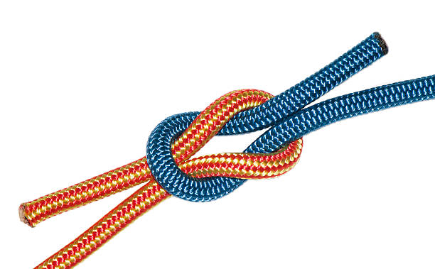 istock reef knot, yellow and blue ropes. 626004826