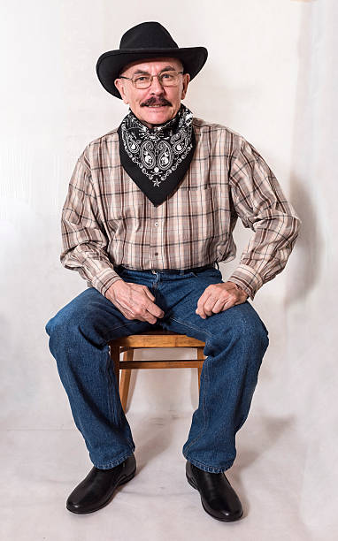 istock The cowboy with mustache, in a black hat 626004934