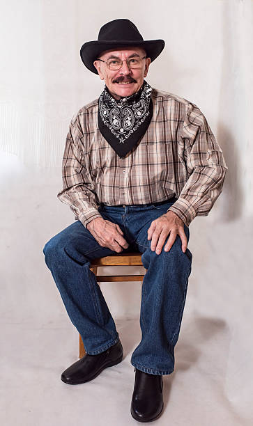 istock The cowboy with mustache, in a black hat 626005110