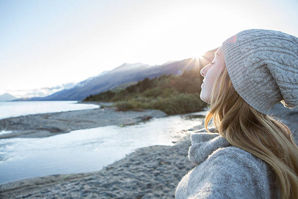 istock Serene woman enjoys mountain fresh air 626005608