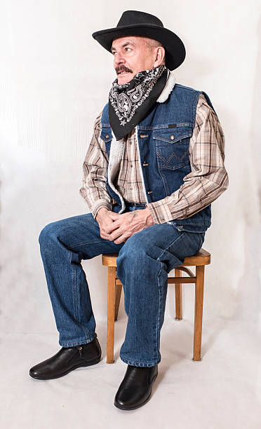 istock The cowboy with mustache, in a black hat 626005672