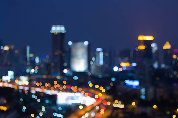 istock Blurred lights city highway and downtown with twilight sky background 626006640
