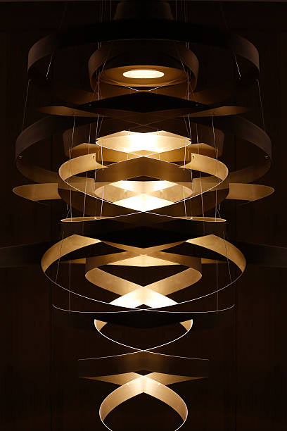 istock Digitally rendered image of lighting fixture with ribbon-shaped structure 626007040