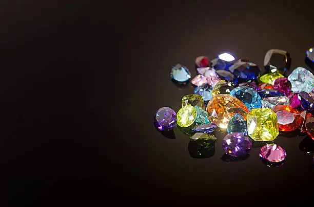 Jewel or gems on black shine color, Collection of many different natural gemstones 
