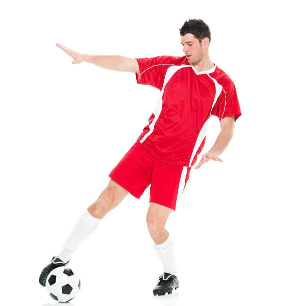 istock Soccer player kicking the ball 626008768