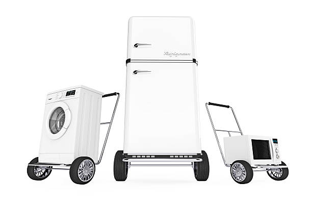 istock Fridge, Washing Machine and Microwave Oven over Hand Carts. 626010700
