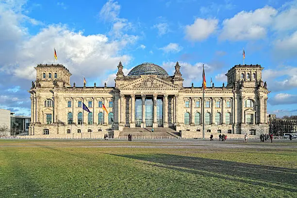 Reichstag building in Berlin, Germany. Dedication on the frieze means "To the German people".