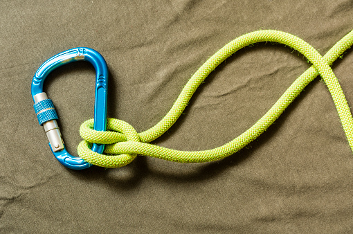 Clove hitch knot tied on a locking carabiner.