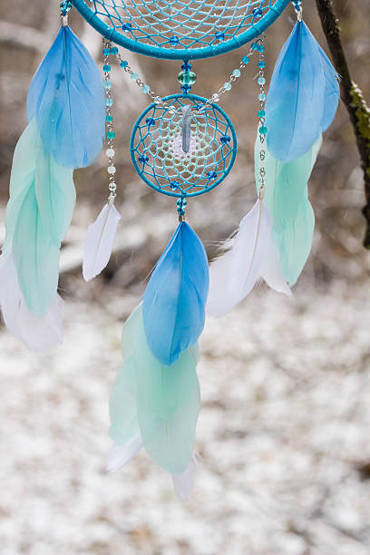 istock Dreamcatcher made of feathers, leather, beads, and ropes 626039822
