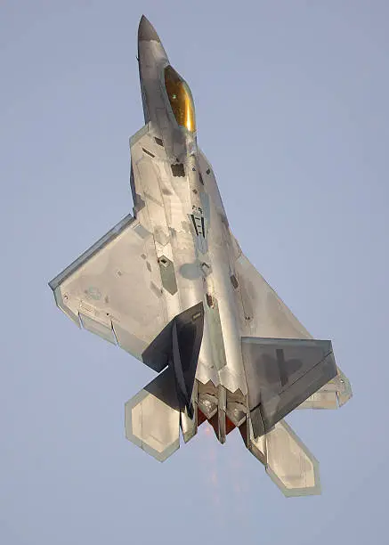 F-22 Raptor in a vertical climb, with afterburner on