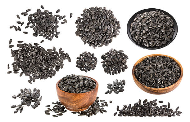 istock Sunflower seeds isolated on white 626055894