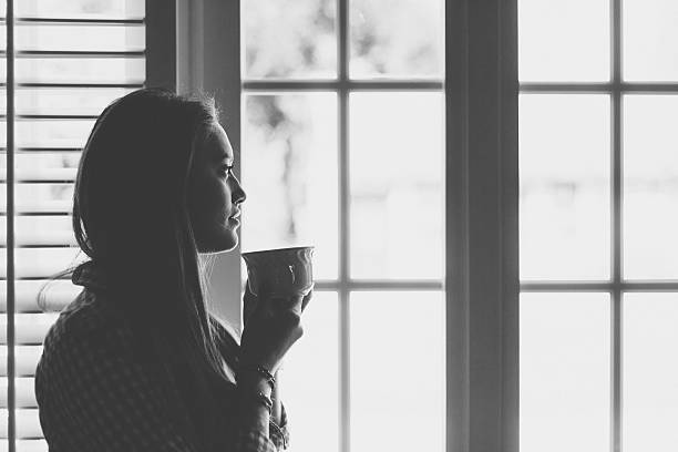 istock Woman at home drinking tea 626057524