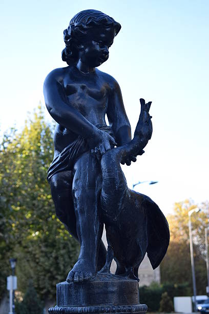 istock Classical sculpture of a child. 626058530