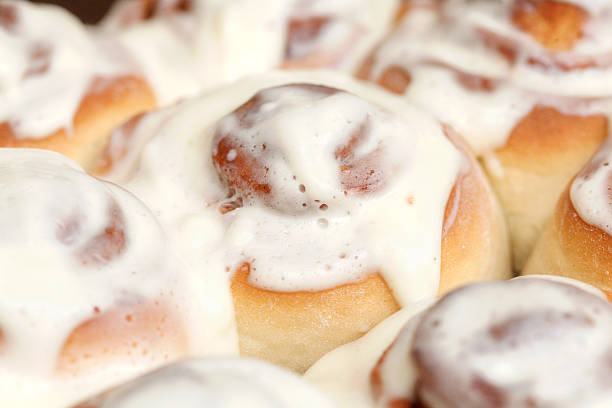 istock Stack of freshly cinnabon, French buns with cinnamon and cream 626060992