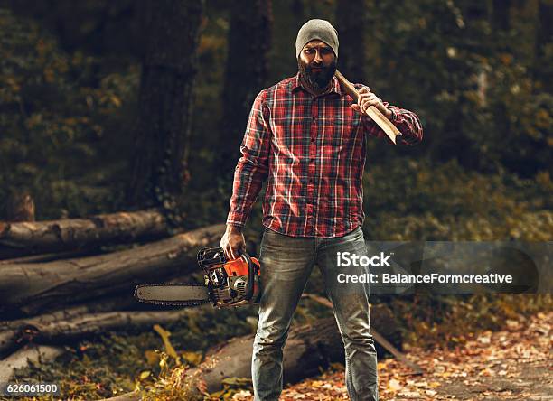 Lumberjack Stock Photo - Download Image Now - Lumberjack, Men, Chainsaw