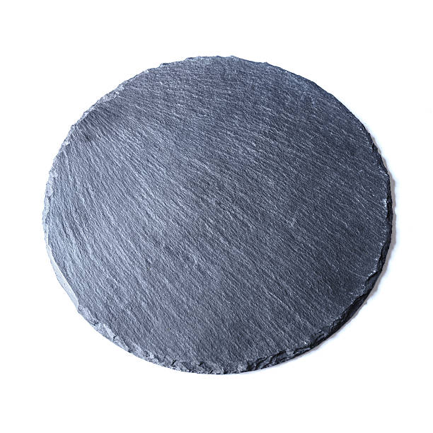 istock Natural black slate dish, isolated on a white background 626061748