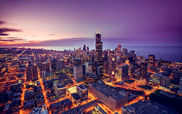 Chicago skyline aerial view at dusk Chicago skyline aerial view at dusk, United States night stock pictures, royalty-free photos & images